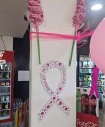 Pink ribbon display for the McGrath Foundation partnership
