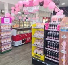 Convenience store decorated in pink for the McGrath Foundation