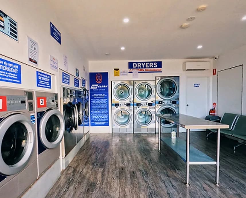Dryers and seating at Laundrette @ Redbank