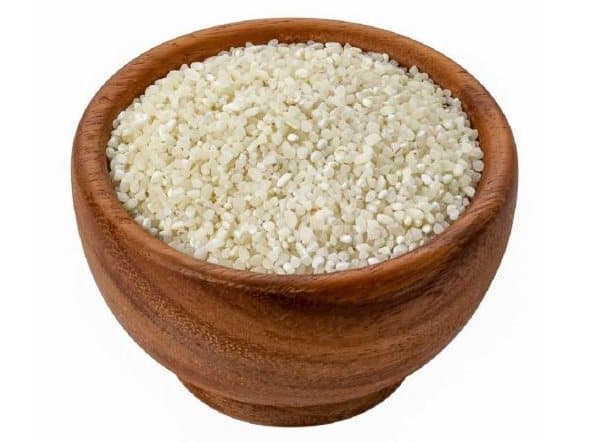 Indian broken rice in a wooden bowl
