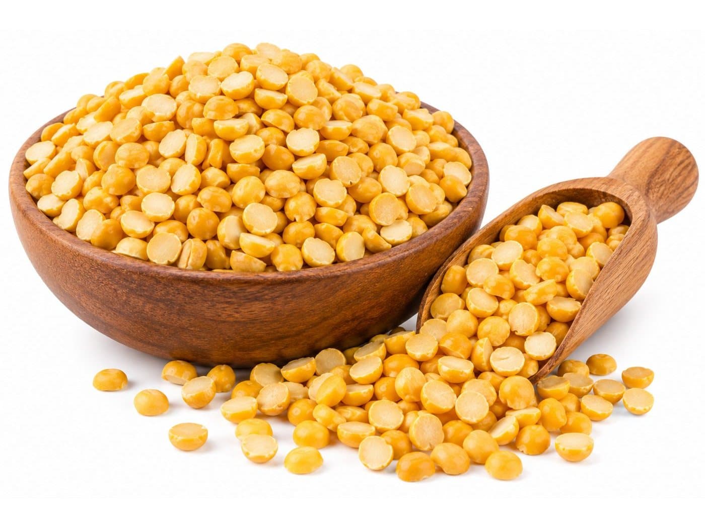 Chana dal in a wooden bowl with a scoop