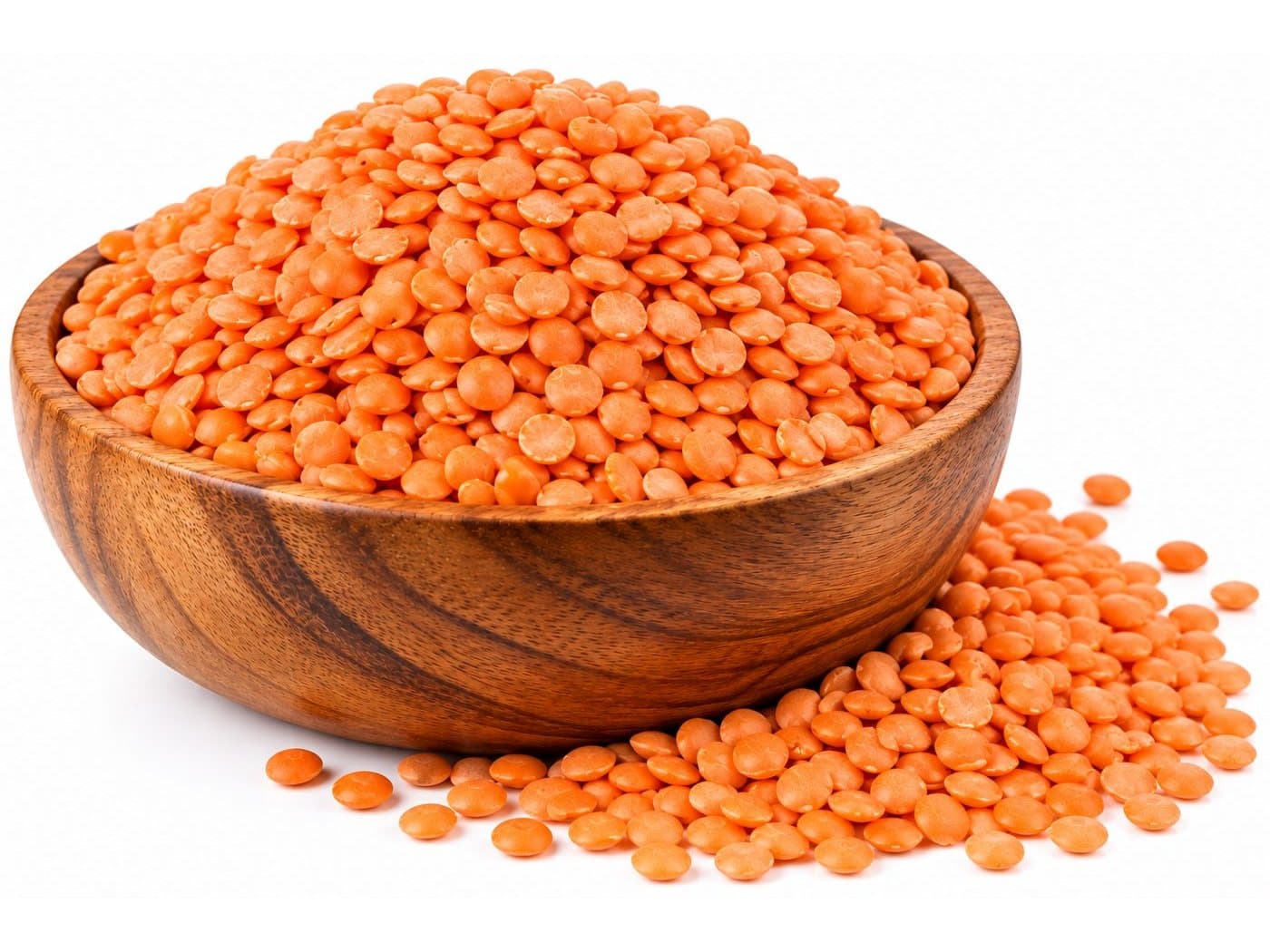 Red lentils in a wooden bowl