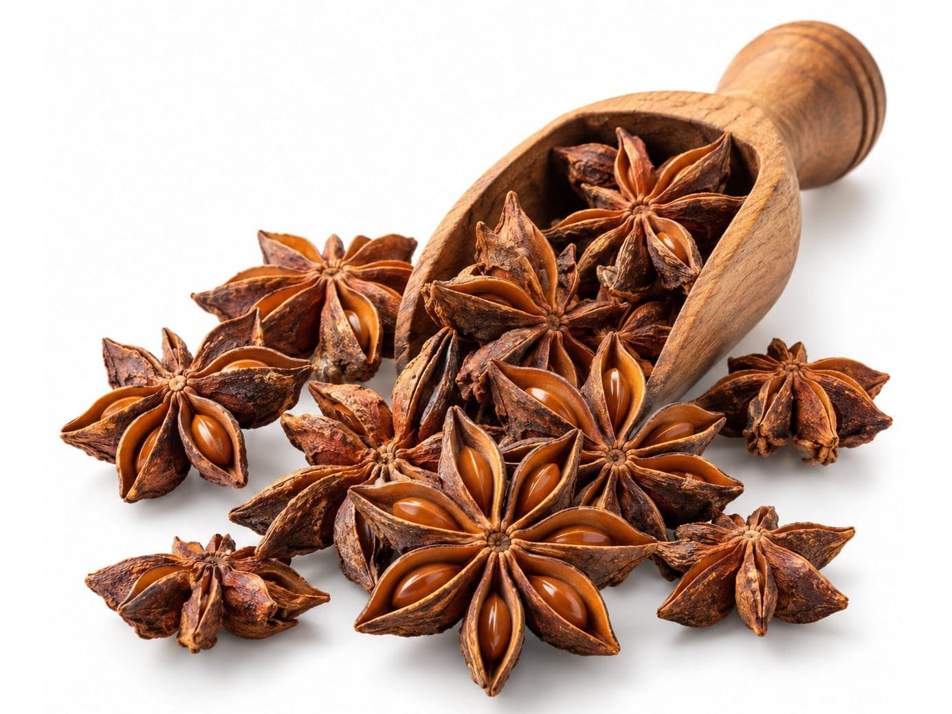 Star anise pods in a wooden scoop