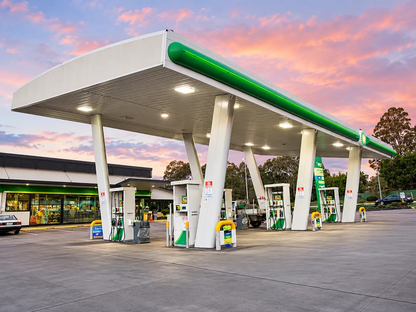 A BP service station forecourt at sunset